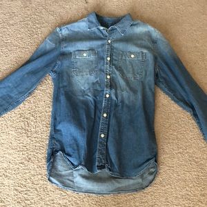 Denim button up shirt.